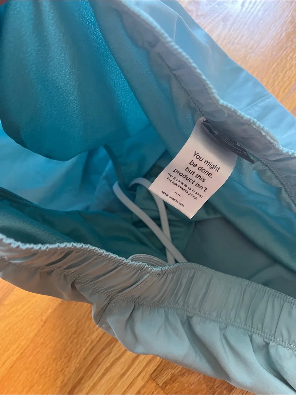 The North Face Light Blue Athletic Shorts with Dark Teal Side Panels